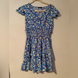 This is a blue floral print flounce sleeve ruffle trim short dress size small